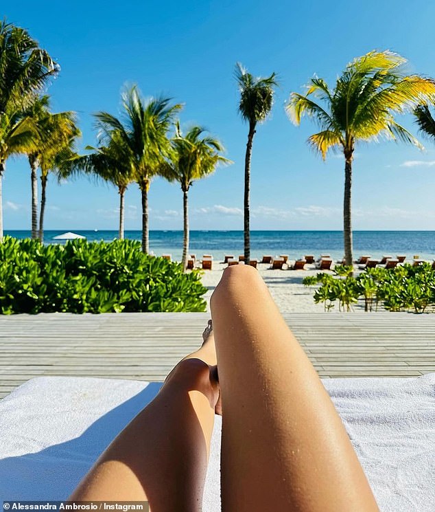 This photo showed her long, lean legs as she sunbathed in Mexico