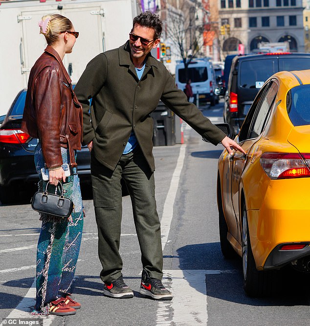 The 49-year-old Maestro star was spotted opening the door of a yellow taxi for the model