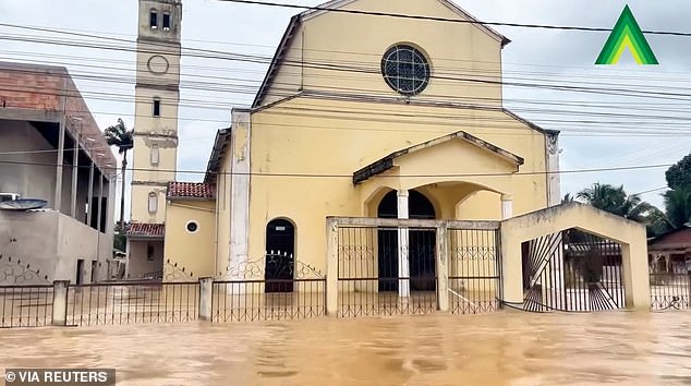 In Brasileia, Brazil, a church was partially submerged after flooding from heavy rains caused the bank of the Acre River to burst.