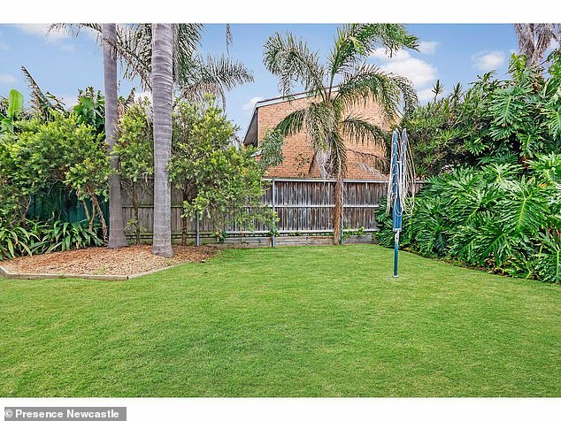 The four-bedroom, two-bathroom home is located in the beachside suburb of Merewether, more than 2 hours north of Sydney