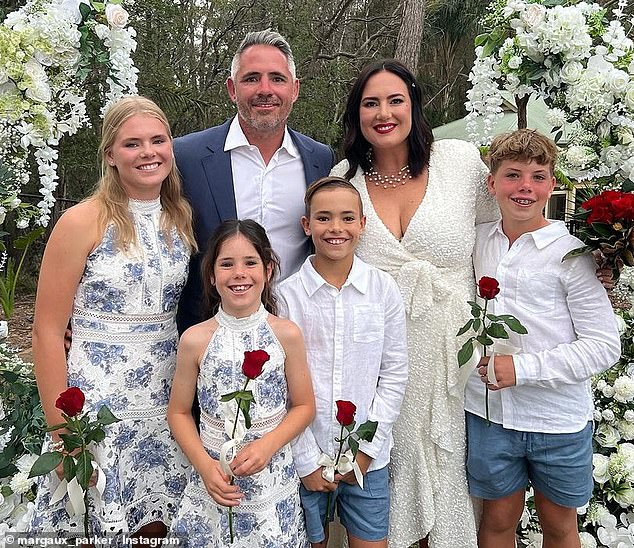 Parker (pictured with husband Corey and their children) said Queensland's Covid vaccine mandate violates human rights and the recent legal decision is a major victory