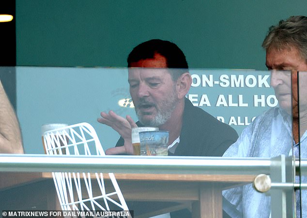 The unassuming greenskeeper was spotted having a beer as he chatted with his friends at Club Cronulla on Tuesday