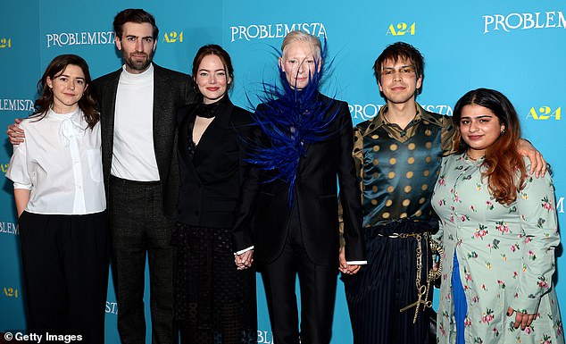 Emma looked sharp in a black blazer worn over a sheer black polka dot dress for the screening, as she posed alongside (L-R) Ali Herting, Dave, Tilda Swinton, Julio Torres and Neha Simon