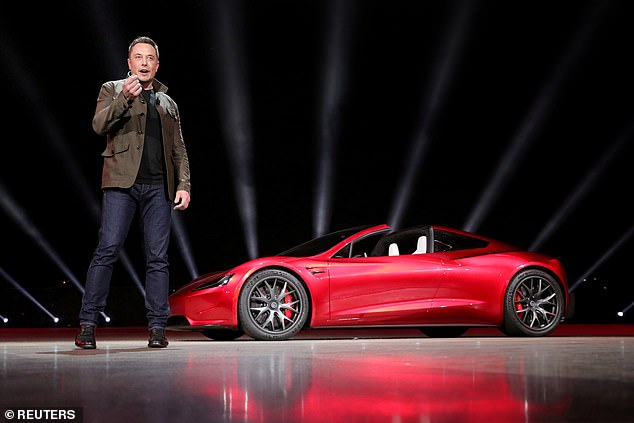 Tesla CEO Elon Musk pictured unveiling Roadster 2 during a presentation in Hawthorne, California, on November 16, 2017. He said at the time that first deliveries would arrive in 2020