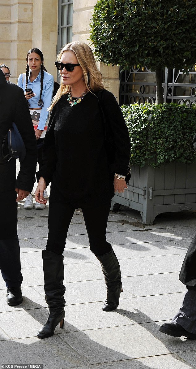 The model, 50, appeared in good spirits during the outing as she donned a black sweater teamed with matching skinny jeans