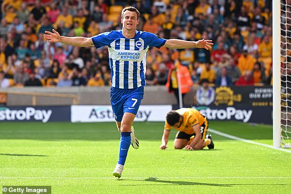 WOLVERHAMPTON, ENGLAND – AUGUST 19: Solly March of Brighton & Hove Albion celebrates after scoring the team's third goal during the Premier League match between Wolverhampton Wanderers and Brighton & Hove Albion at Molineux on August 19, 2023 in Wolverhampton, England .  (Photo by Clive Mason/Getty Images)