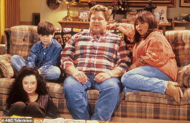 That way they could fire people without even using their names;  instead, he said they would tell people to leave using the number on their shirts.  Roseanne is seen (far right) in the show
