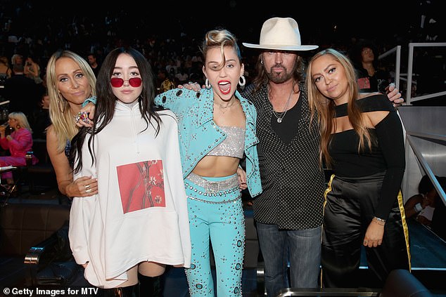 Billy Ray and Tish's divorce is said to have caused a rift between their children, with sources saying Miley (seen with her parents and siblings Noah and Brandi in 2017) remained close to her mother, while Noah sided with her father chose.