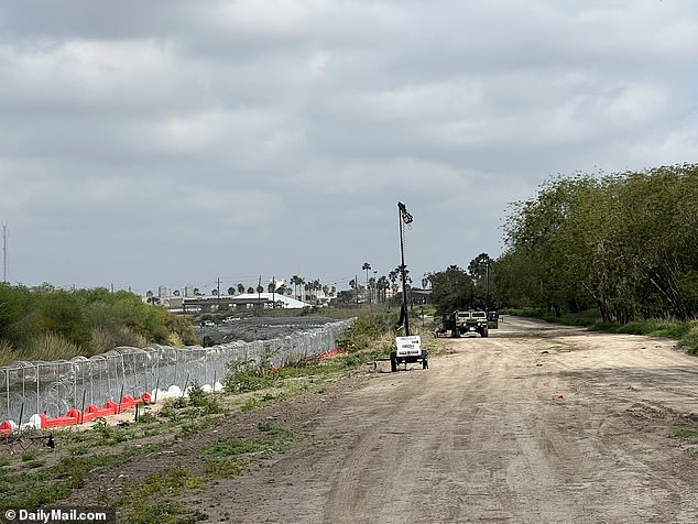 Members of the Texas National Guard on patrol at the border - border crossings have been down since Republican Governor Greg Abbott installed fencing