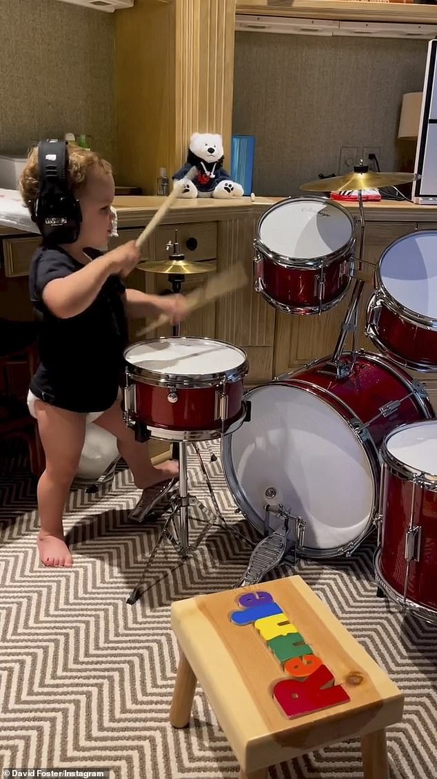 Although the drumming in McPhee's new video wasn't Rennie's, the toddler has shown off his drumming skills in the past on both her and David's Instagram accounts