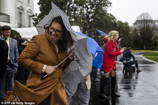 Reporters are sprayed by Marine One as President Joe Biden departed from the South Lawn of the White House on Wednesday morning for his annual physical at Walter Reed