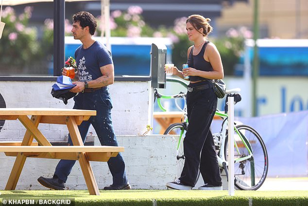 Joe and Stormi enjoyed drinks at the outdoor venue