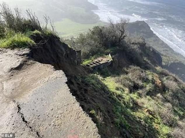 A huge section of the cliff top, including part of the car park at the start of the trail, slides into the sea