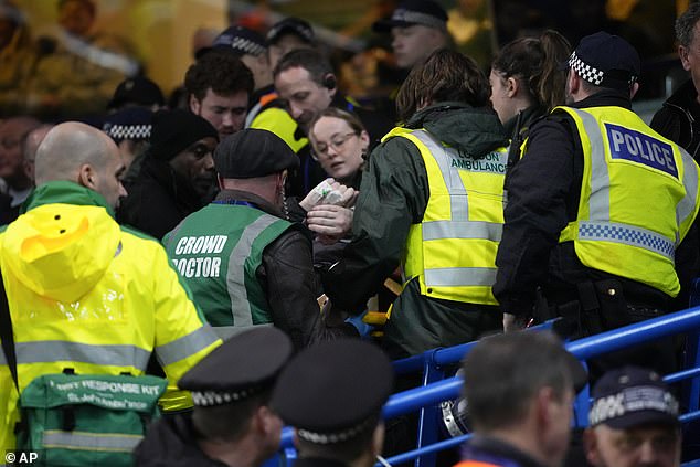 The supporter was quickly taken to hospital after the fall, where fellow traveling fans looked concerned