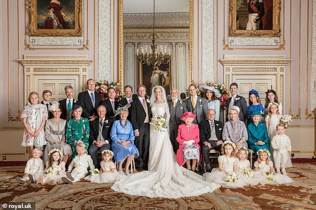 Lady Gabriella and Thomas Kingston have official photos taken on their wedding day.  To their right are the late Queen and Prince Philip