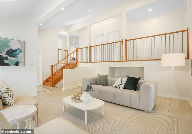 A real estate photo shows the living room of Beau Lamarre-Condon's childhood home when it was listed for sale in 2021 for $2.27 million