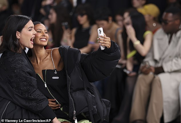 The Love Island host soaked up the atmosphere as she took selfies with Jessie Ware in the front row