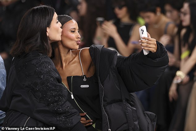 Maya couldn't help but pout at the camera as she walked around the runway show headline