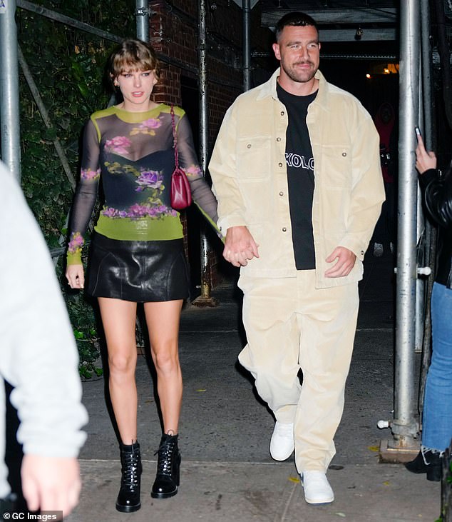 A source said: 'Travis is a big guy and no one would mess with him because when it comes to Taylor, he wouldn't play if anyone came near her.  She always has a built-in bodyguard