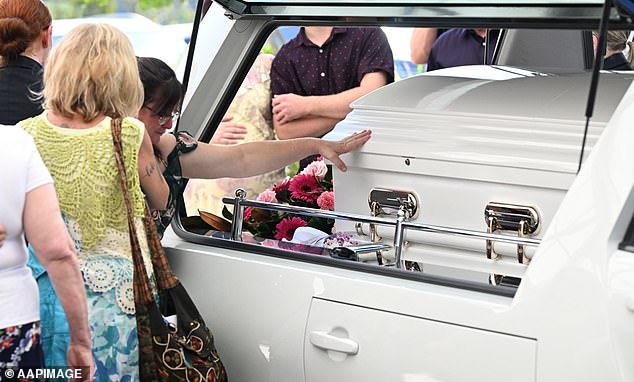 Some members gathered at the funeral service (pictured) fell to the ground as they mourned the loss of their beloved grandmother