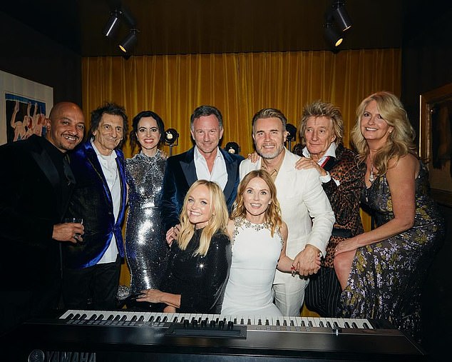 (Back row, from left) Jade Jones, Ronnie Wood and wife Sally, Christian Horner, Gary Barlow, Rod Stewart, Penny Lancaster.  (Front row) Emma Bunton and Geri Halliwell at 50th birthday