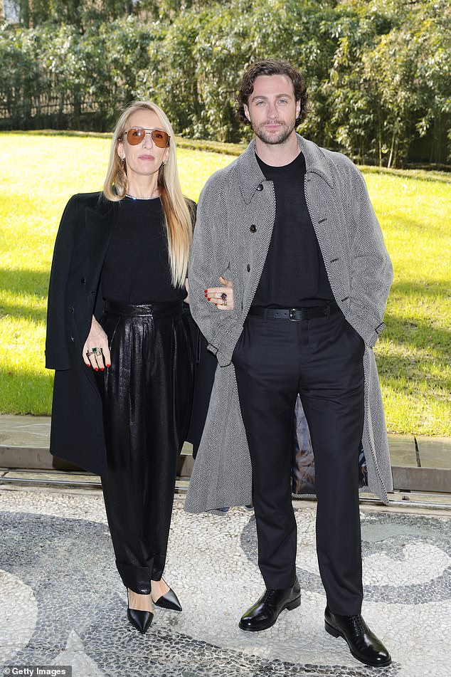 Aaron Taylor Johnson attended Giorgio Armani's fashion show during Milan Fashion Week on Sunday with his wife Sam
