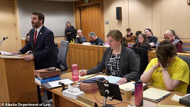 Denali Dakota Skye Brehmer, 23, covered her face as she was sentenced to 99 years in prison for the murder of Cynthia Hoffman