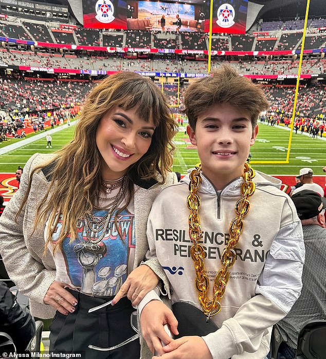 Alyssa Milano was labeled a 'rich beggar' for attending Super Bowl LVIII at Allegiant Stadium in Paradise, NV with her 12-year-old son Milo Thomas Bugliari on Sunday following her GoFundMe scandal