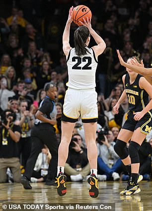 Clark hit a pull-up jumper off the Hawkeyes logo to seal the record for himself