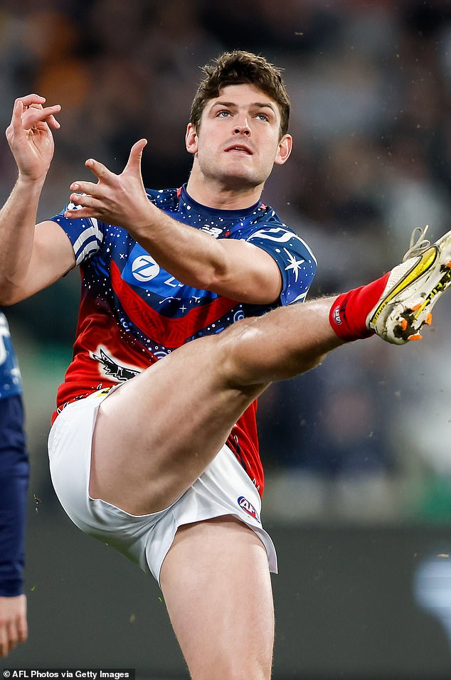 Brayshaw (pictured last year) will be remembered by Demons fans for the courageous goal that turned the tide in the club's 2021 grand final victory