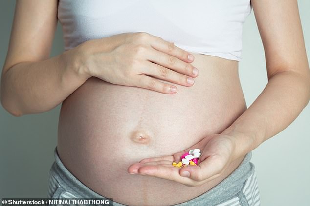 Research shows that taking antidepressants during pregnancy or while breastfeeding can damage a baby's brain (stock image)