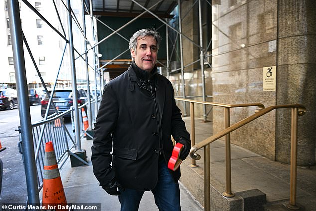 Michael Cohen holding a box of Valentine's Day chocolates on his way to meet Alvin Bragg ahead of Donald Trump and Stormy Daniels' hush money trial