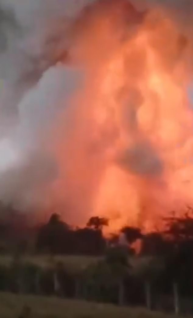 Images on Indian television showed a tower of flames after the explosion at the fireworks factory in Harda in Madhya Pradesh state