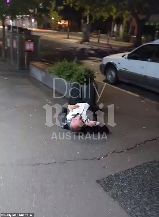 Barnaby Joyce was seen on the sidewalk talking on the phone (pictured)