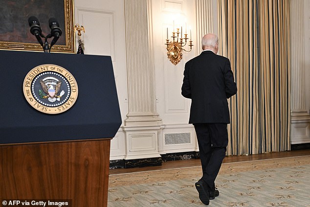 When his scripted speech ended, Biden closed his folder, turned to his left and left the state dining room without responding to questions from reporters.