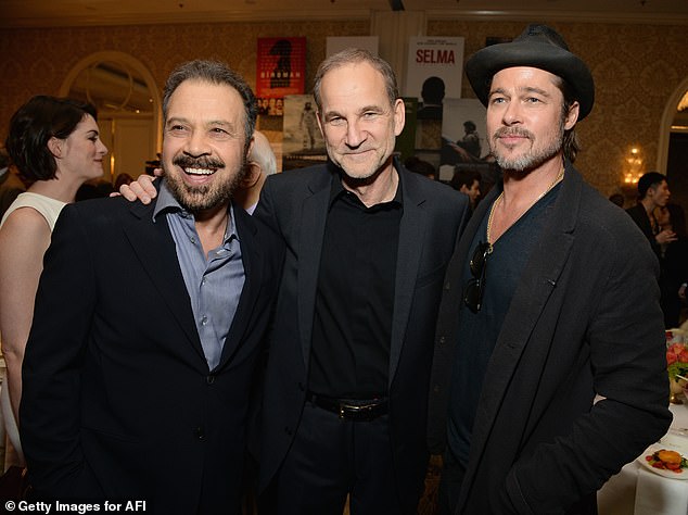 He recalled one of their on-set written 'dustups' in which they reportedly 'yelled, swore and threw chairs' and that it was 'not the last time this happened';  (L-R) Zwick, Marshall Herskovitz and Pitt in 2015