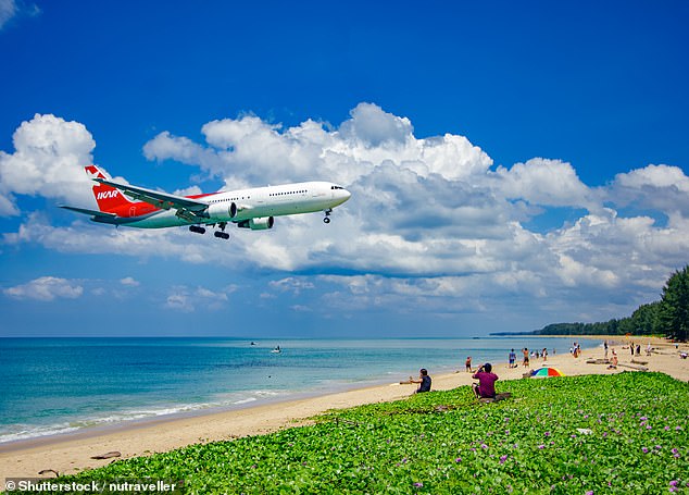 The man was riding a scooter back from the beach on the popular tourist island of Phuket in southern Thailand (file image of a beach in Phuket)