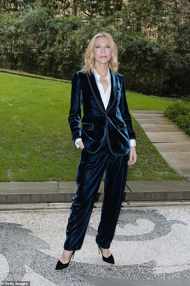 The Oscar-winning actress, 54, looked stylish in a blue velvet suit, white shirt and black heels