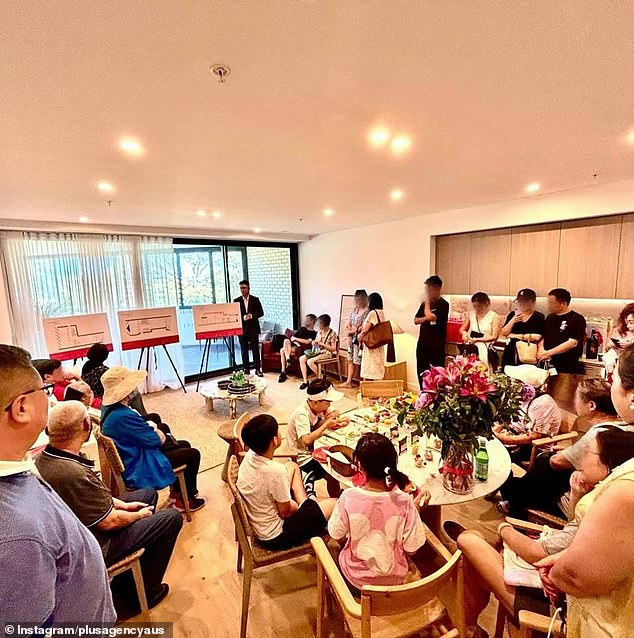 Chinese investors are now smartly buying property after becoming permanent residents to avoid new rules for foreigners (pictured are potential buyers in Sydney)