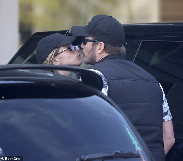 Chris Pratt, 44, and wife Katherine Schwarzenegger, 34, were spotted sharing a kiss as they walked back to their car after enjoying a sushi lunch together at Sugarfish