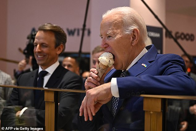US President Joe Biden speaks with host Seth Meyers as they enjoy ice cream