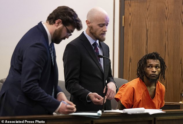 Public defenders William Patrick and Nick Rogers (pictured left) represent suspect Nicholas Jordan, 25, in El Paso County 4th District Court, Colorado Springs, Colorado