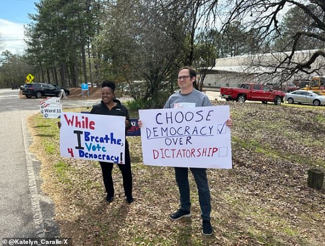 The organization PrimaryPivot actively encouraged Democrats to forgo their own primaries to participate in the Republican primaries.  PrimaryPivot co-founder Robert Schwartz (right) and South Carolina senior advisor Tiffany James (left) stood outside the Ben Arnold Community Center polling place in Columbia, South Carolina on Saturday, prompting voters to cast their ballots against Trump