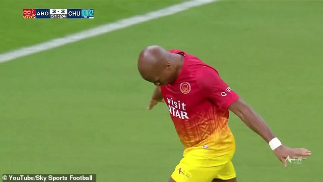 Didier Drogba celebrates after scoring the first of his two goals in Friday's charity match