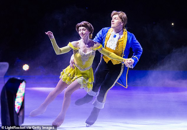 The skater who played Belle on Disney on Ice's Saturday program: Magic in the Stars fell while being lifted into the air by another cast member during the performance at Target Center in Minneapolis, Minnesota.  Pictured: Disney on Ice skaters perform Beauty and the Beast during a performance in Toronto, Canada in 2016