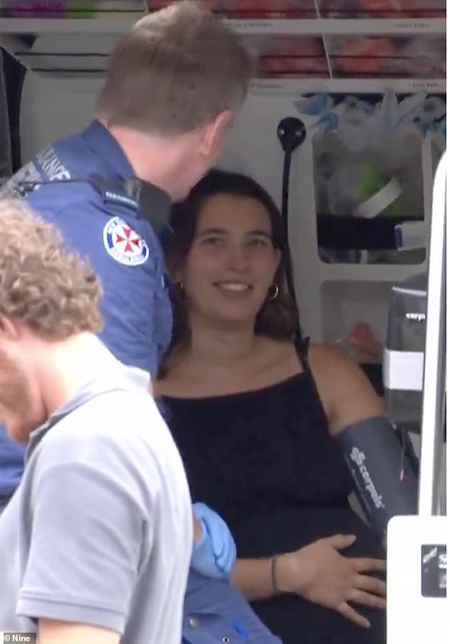 Gretta (pictured while receiving treatment after the incident) and Sebastian Lough were driving through the Eastern Distributor near the Randwick/Bondi exit around lunchtime on Thursday when smoke began pouring from the engine of their Hyundai