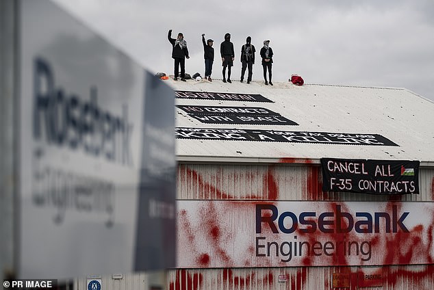 Eight activists aged between 26 and 62 were arrested on Monday afternoon, hours after climbing onto the roof of an aircraft factory in Bayswater in the city's east about 6am.