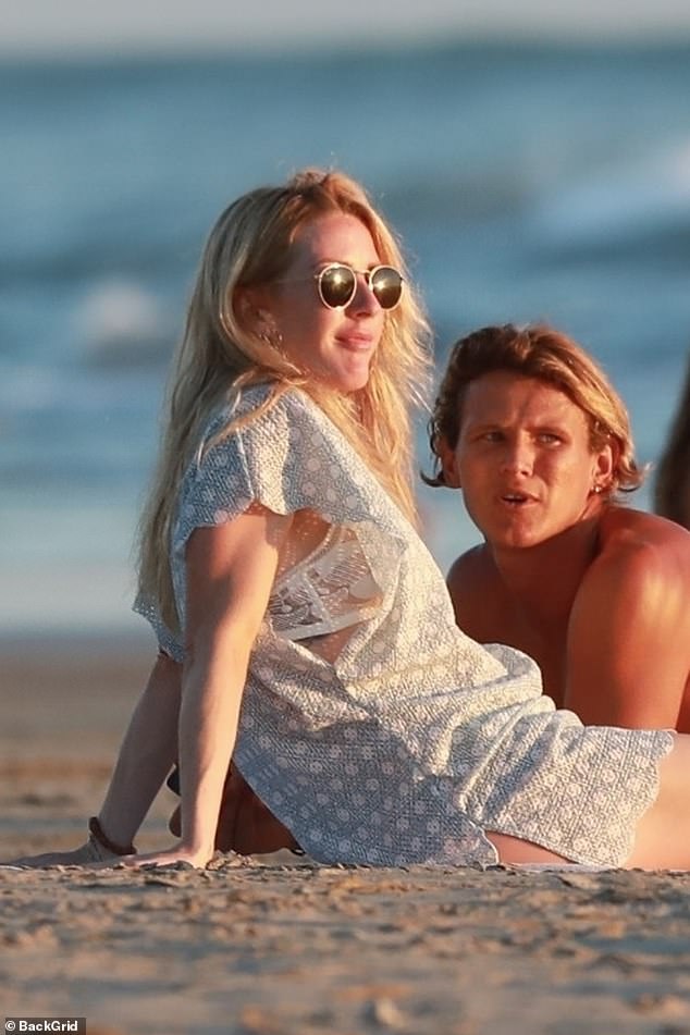 Ellie Goulding appeared smitten with surf instructor Armando Pereza this week during a holiday to Costa Rica, after announcing her split from husband Caspar Jopling