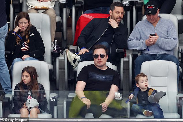 Elon Musk is in Las Vegas for Super Bowl LVIII with his youngest son, X AE A-Xii (right), three