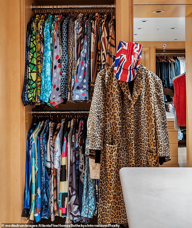 John, who had a close relationship with Gianni Versace before the designer's murder, has a whole closet full of vintage Versace shirts, each of which will retail for several thousand dollars.